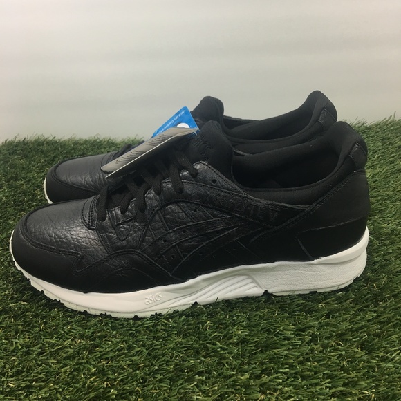 black sports shoes with white sole